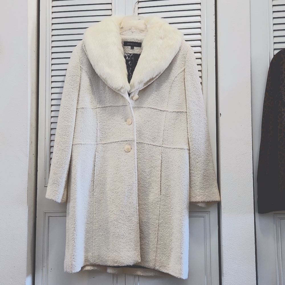 White faux fur coat